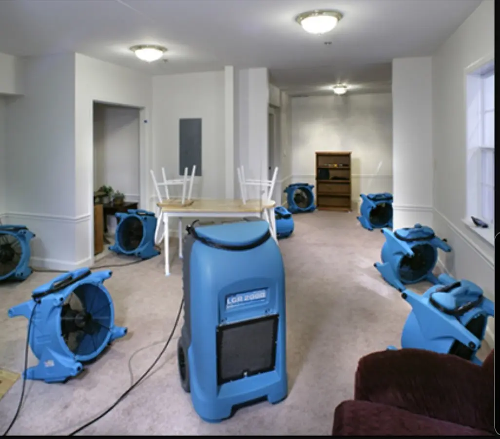 Air movers and dehumidifier setup for Water Damage Restoration in Columbine